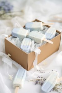 Cake popsicles in dusty blue and ivory
